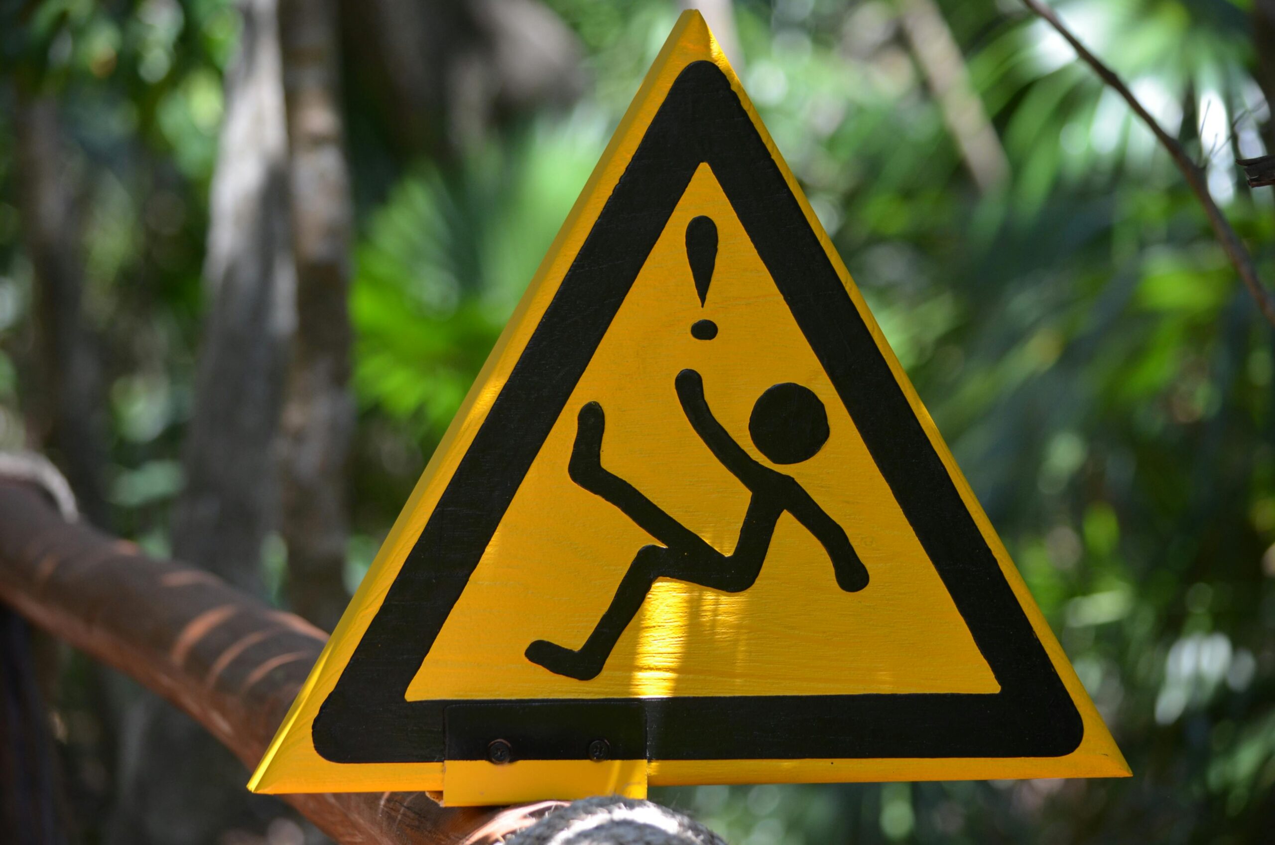 Image of a warning sign with someone falling
